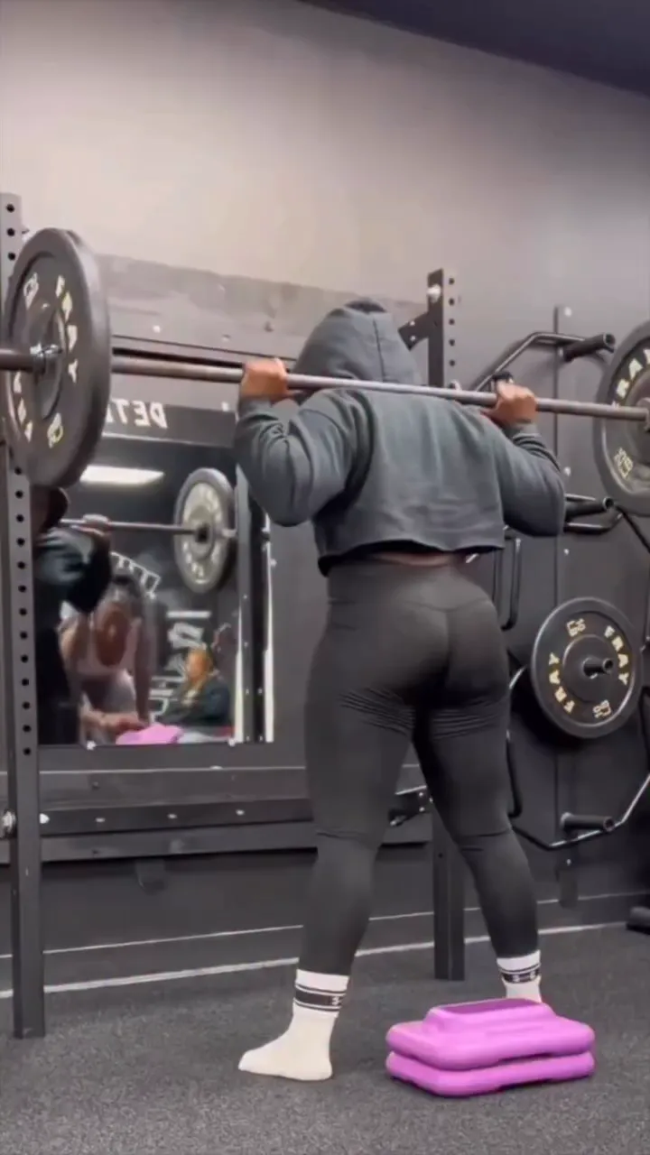 Still from the video: Heel Lifts Off Ground During Squat? Ankle Fix